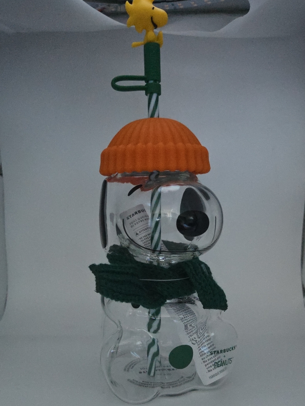Starbucks Clear Snowman Fish Feeder with Orange Cap and Green Scarf